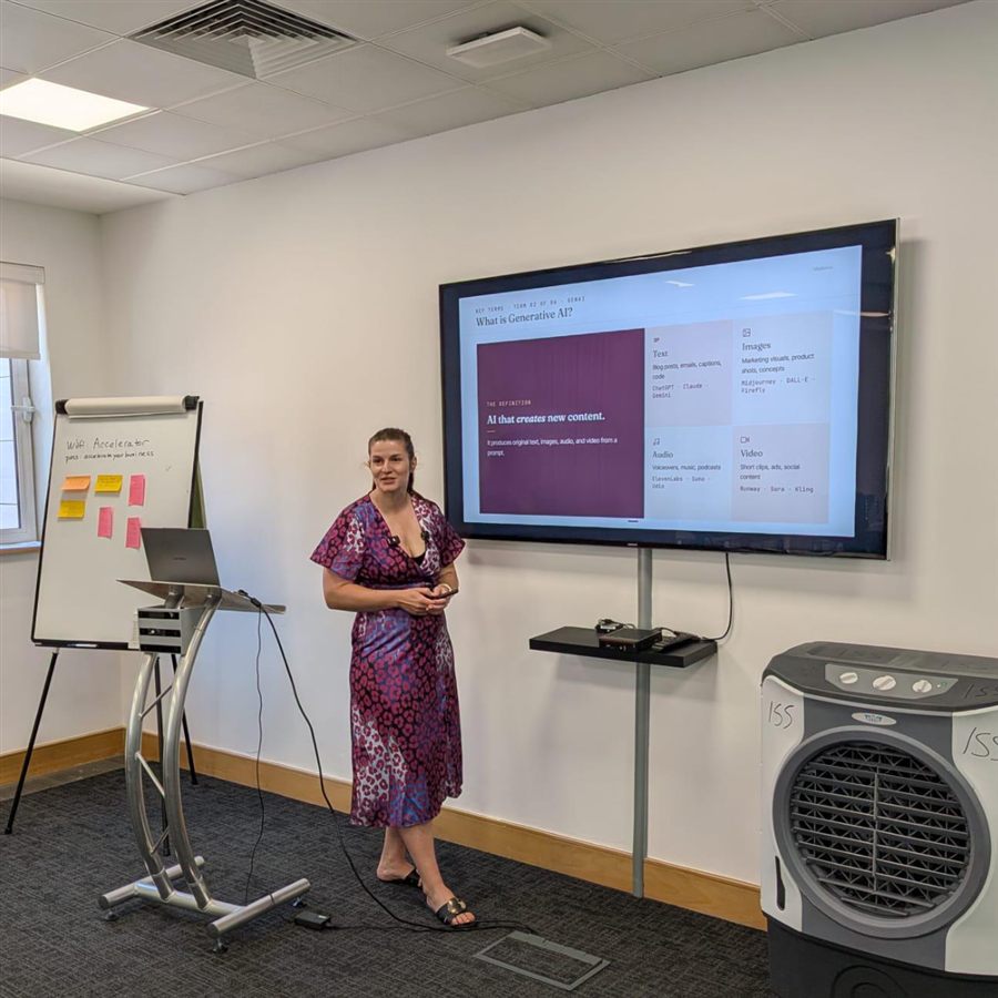 Jitka Lopez delivering an AI workshop, presenting from a screen